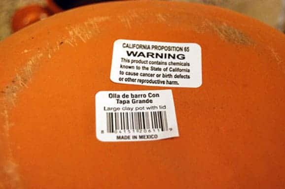 cafe de la olla warning label